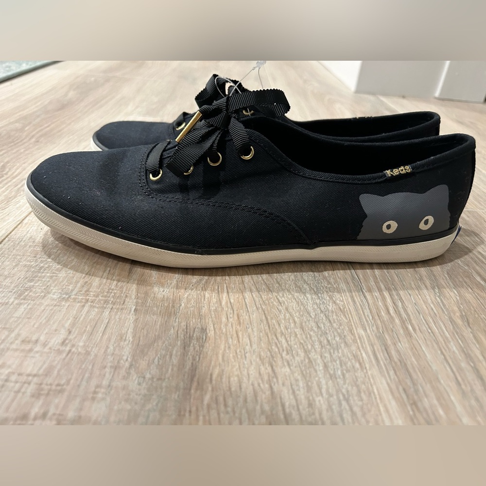Taylor swift collab with Keds.  “Sneaky cat” design.